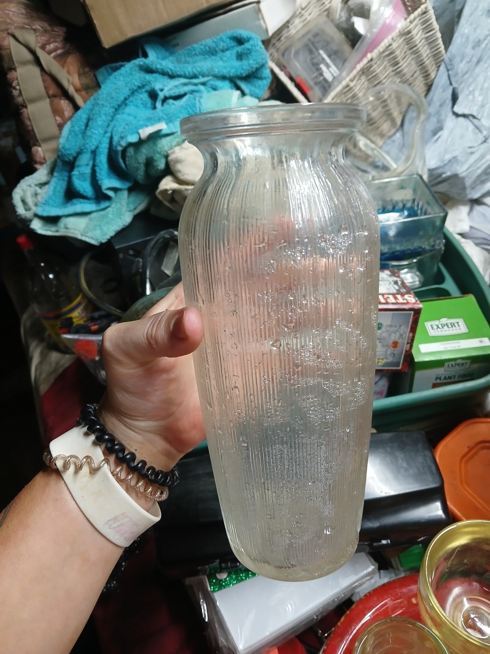vintage FTDA flower vase is characterized by its clear, ribbed glass constructio